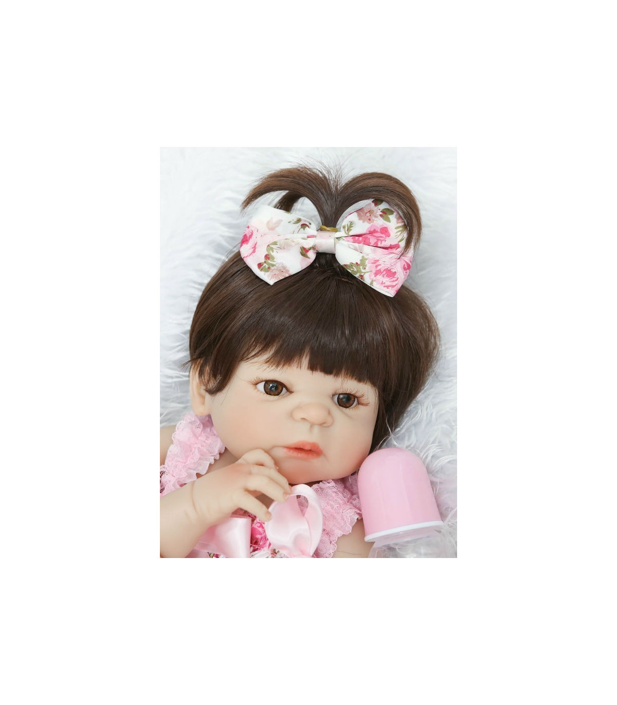 Bebé tipo reborn de 57 cm con moño