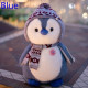 Peluche pinguino invierno