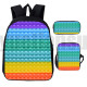 lote de mochila bandolera y estuche pop it