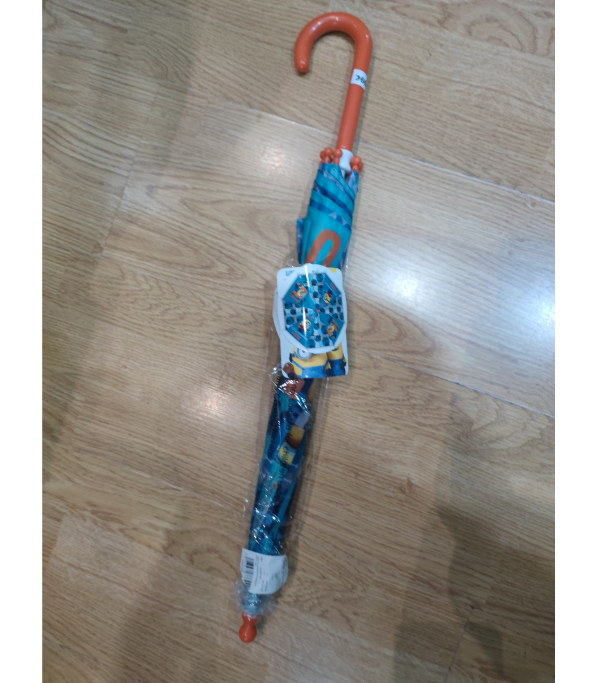Paraguas de los minions de color azul claroi naranja