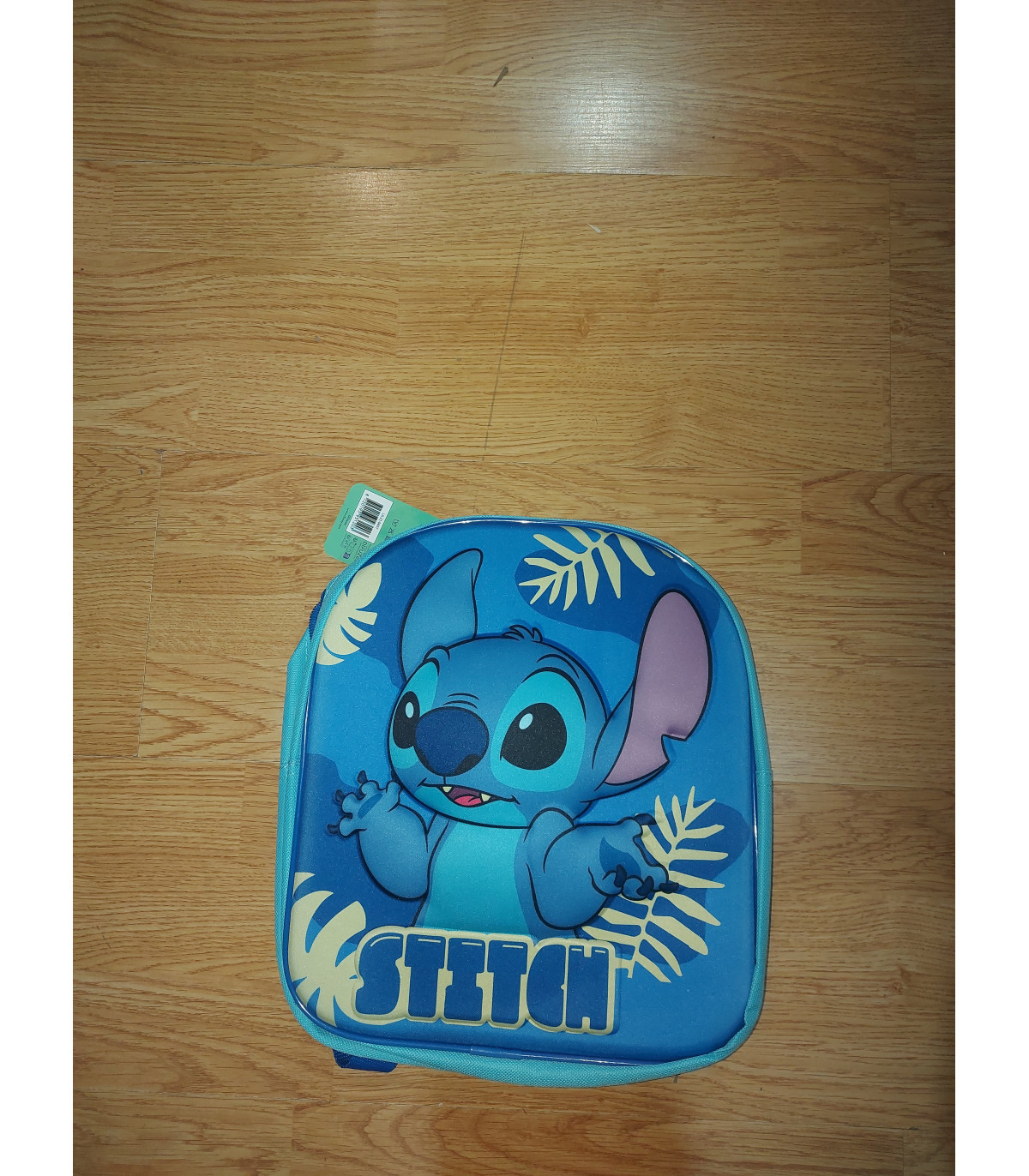 Mochila de lilo i stich de color azul oscuro con el muñeco en el medio